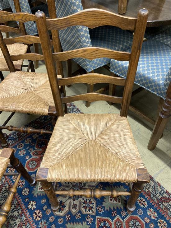 A late 19th / early 20th century set of six ash rush seated ladderback dining chairs